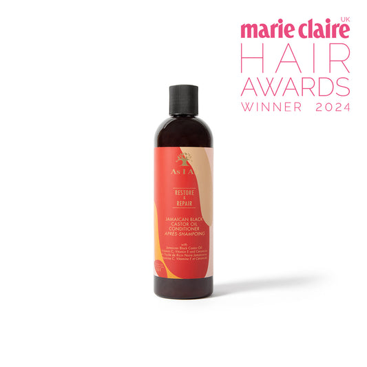 A bottle of Jamaican Black Castor Oil Conditioner with an award label stating 'marie claire HAIR AWARDS WINNER 2024'.