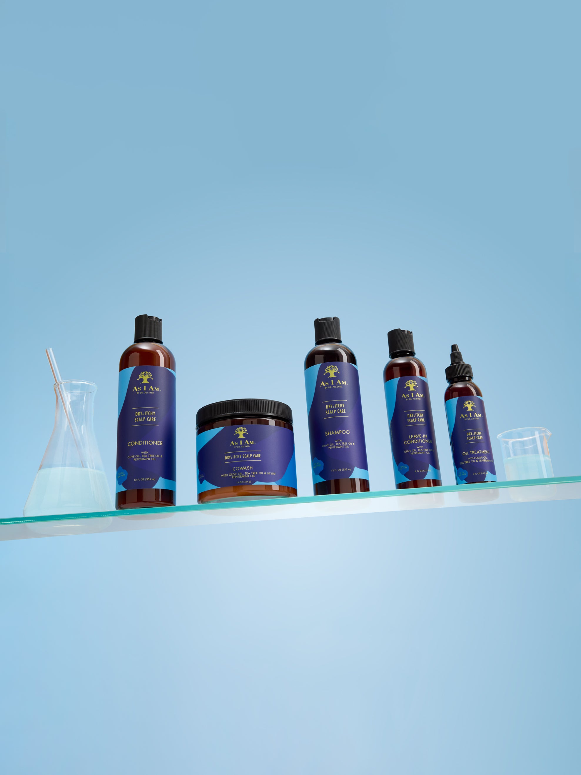 Set of skincare products on a shelf against a light blue background
