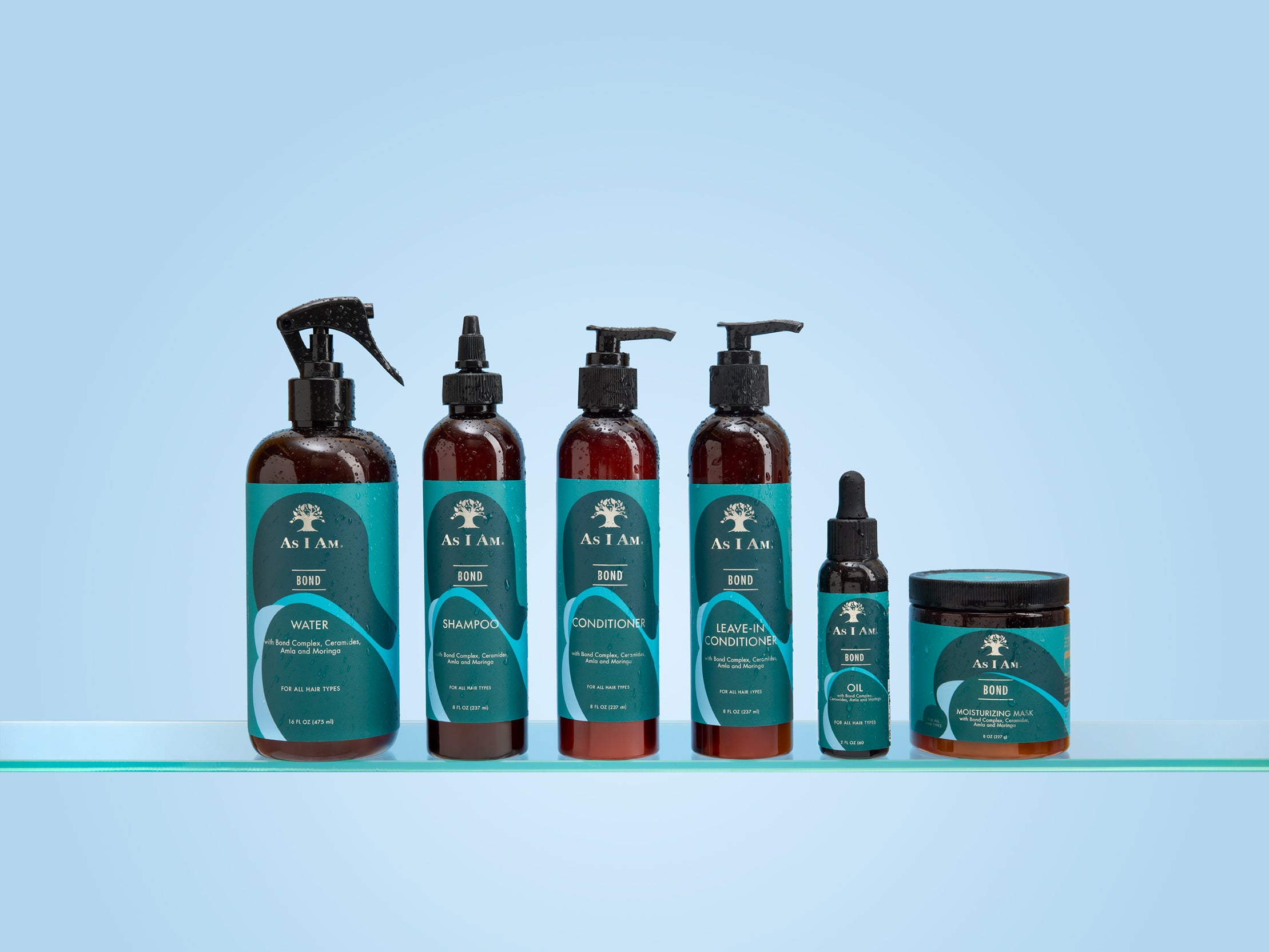 Set of A & EAN hair care products on a light blue background