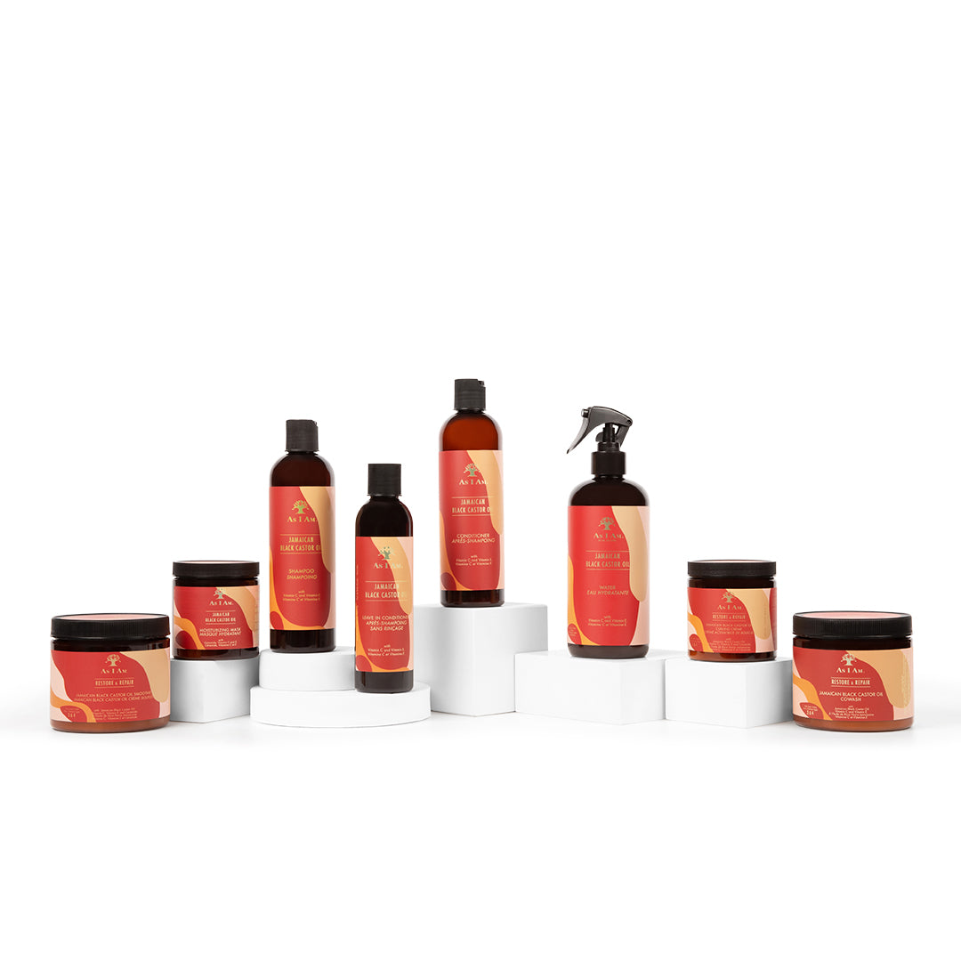 Set of hair care products with red and orange labels on a white background