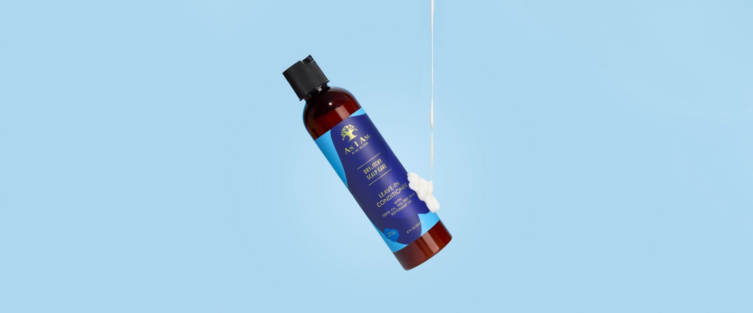 Blue bottle with a dropper on a light blue background