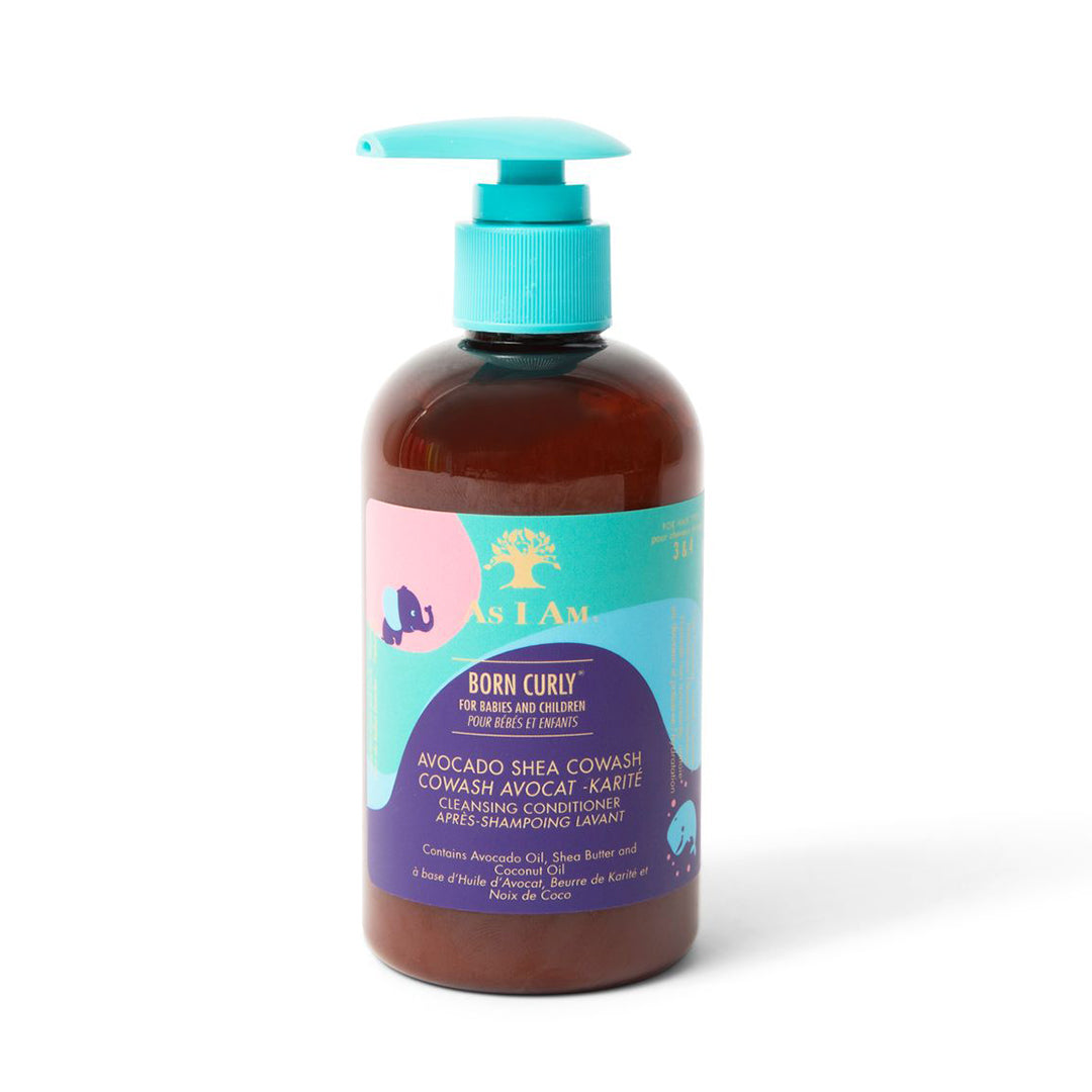 A bottle of As I Am Born Curly Avocado Shea CoWash Shampoo with a pump dispenser, predominantly brown in color with a label featuring avocado and tree imagery.