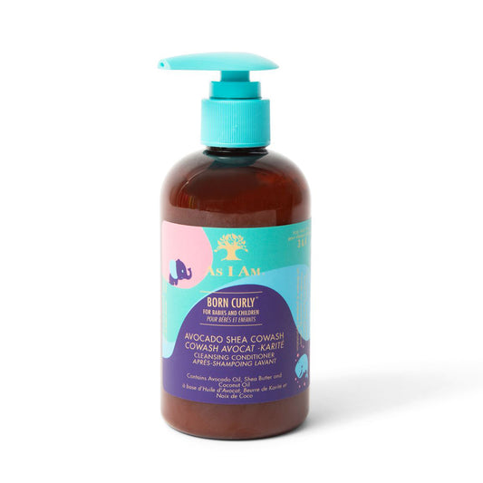 A bottle of As I Am Born Curly Avocado Shea CoWash Shampoo with a pump dispenser, predominantly brown in color with a label featuring avocado and tree imagery.