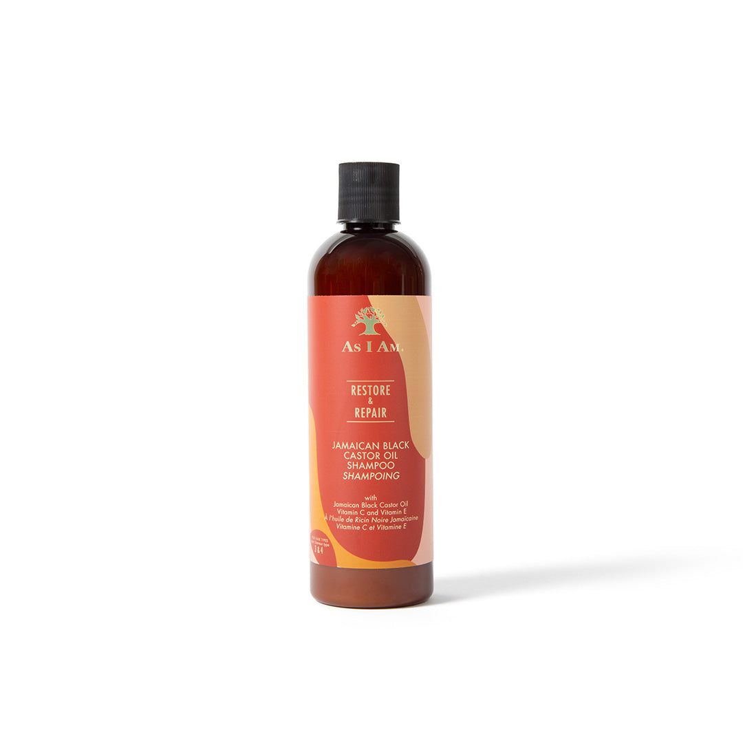 A bottle of Jamaican Black Castor Oil shampoo with a brown label and a black cap.